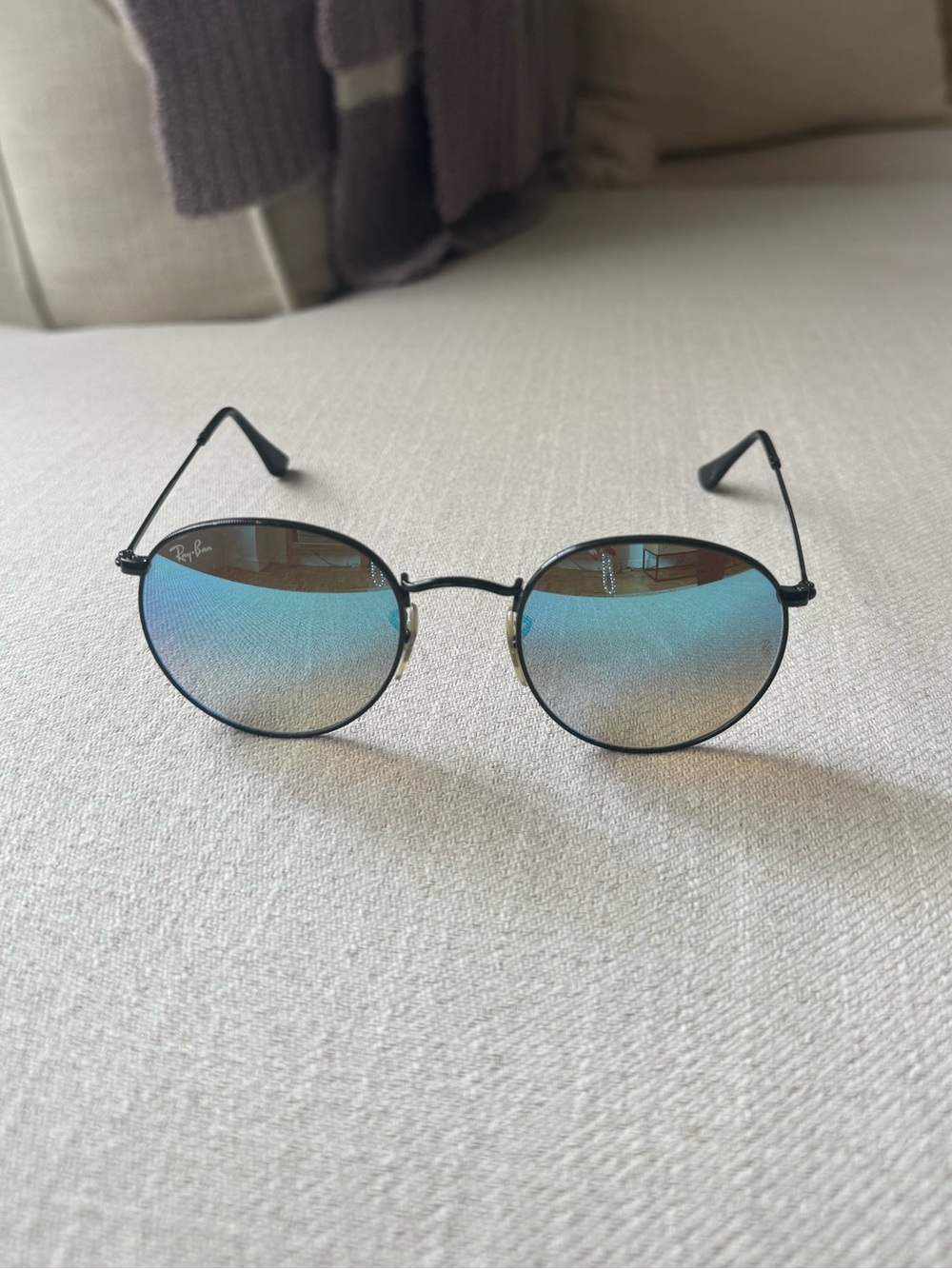 Ray-Ban Black Frame Sunglasses with Blue Mirrored Lenses